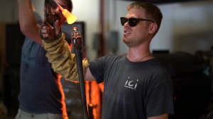 Ben Ahlgrim working with hot glass