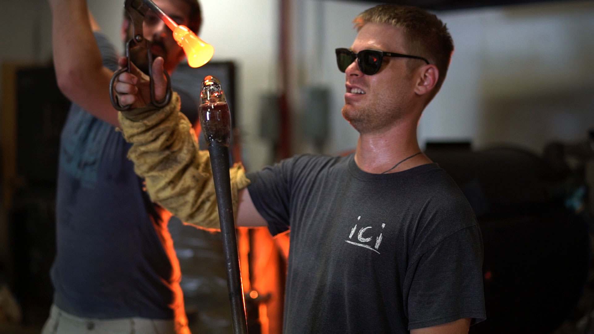 Ben Ahlgrim working with hot glass
