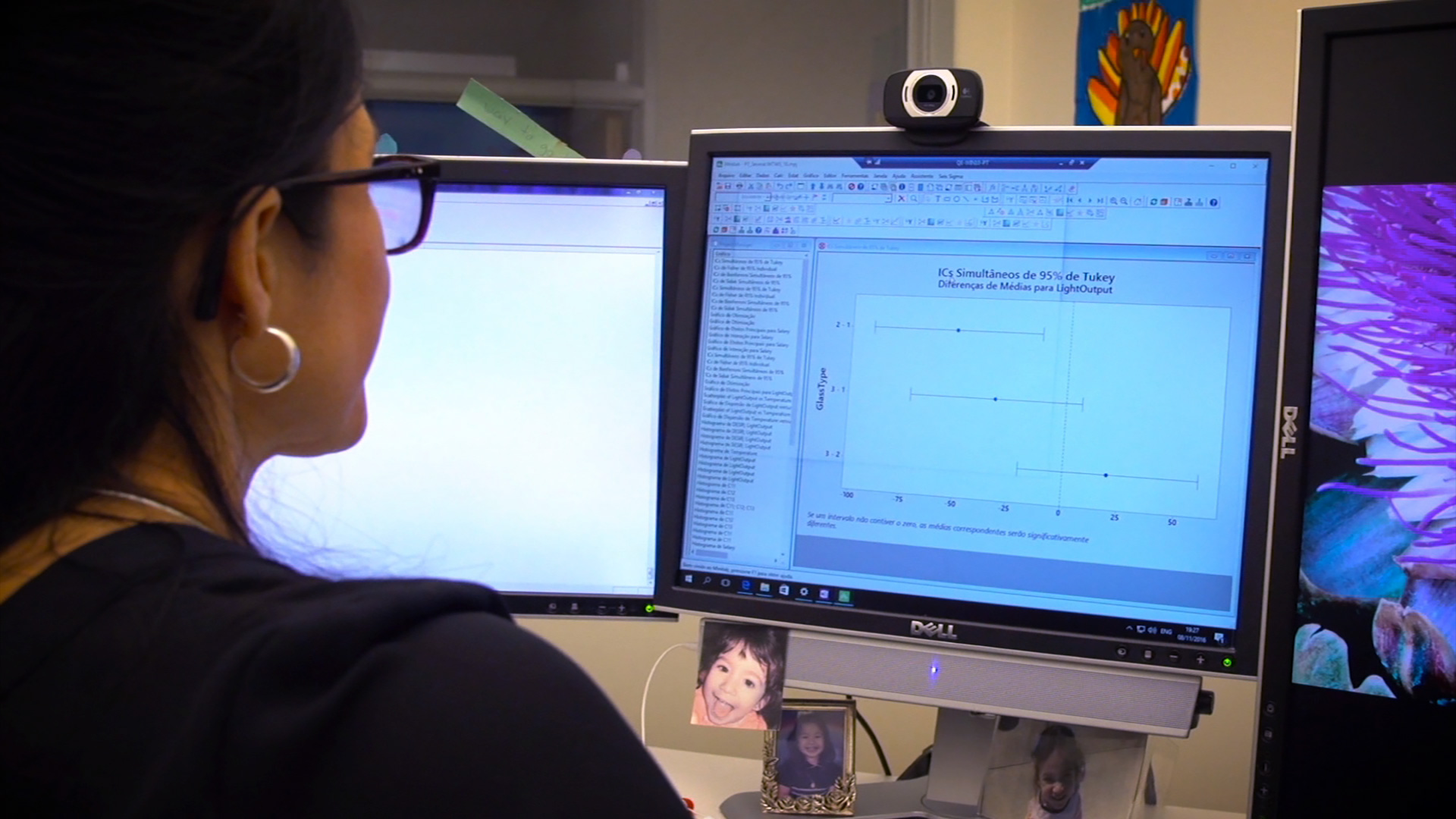 woman looking at technical software on computer screen