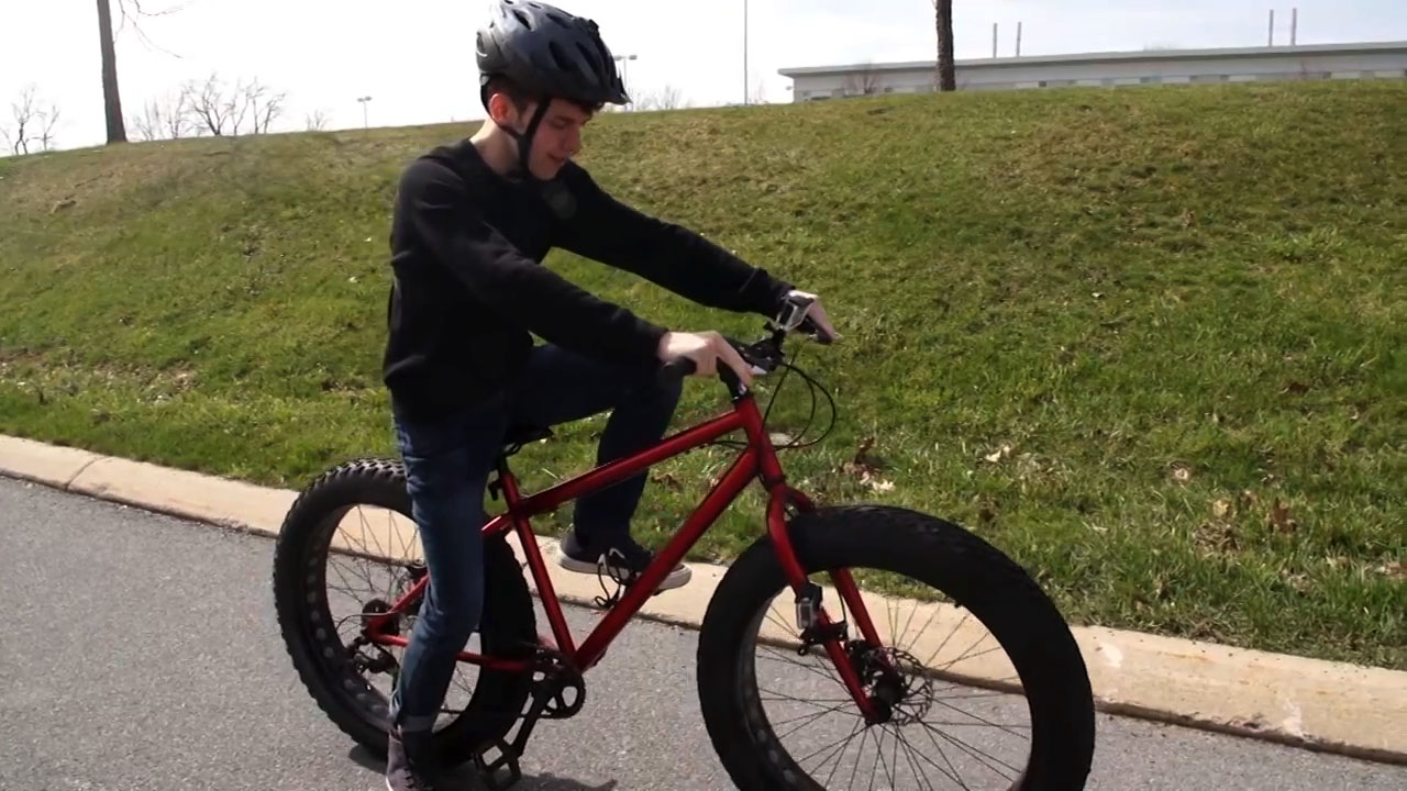 man riding bike