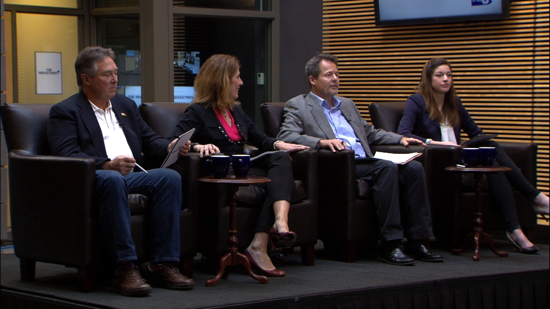 Panel of judges on the set of The Investment