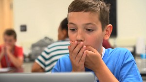 Young boy looks surprised