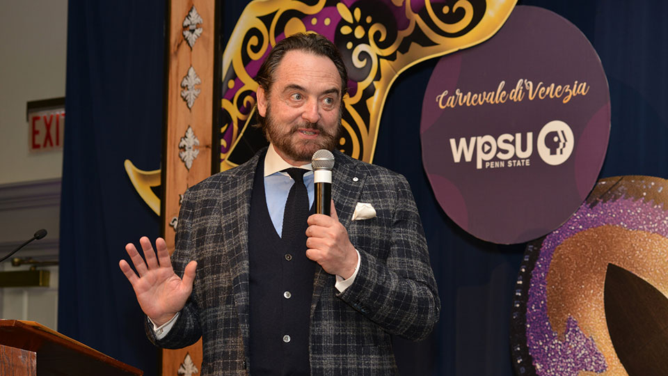 Chef Nick Stellion on stage at WPSU Connoisseur's Dinner and Auction