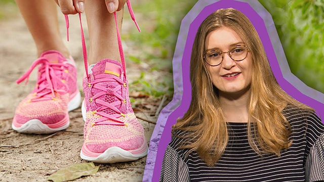 woman standing in front of a close-up of a persons feet