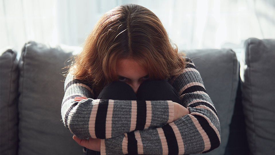 young adult in grief