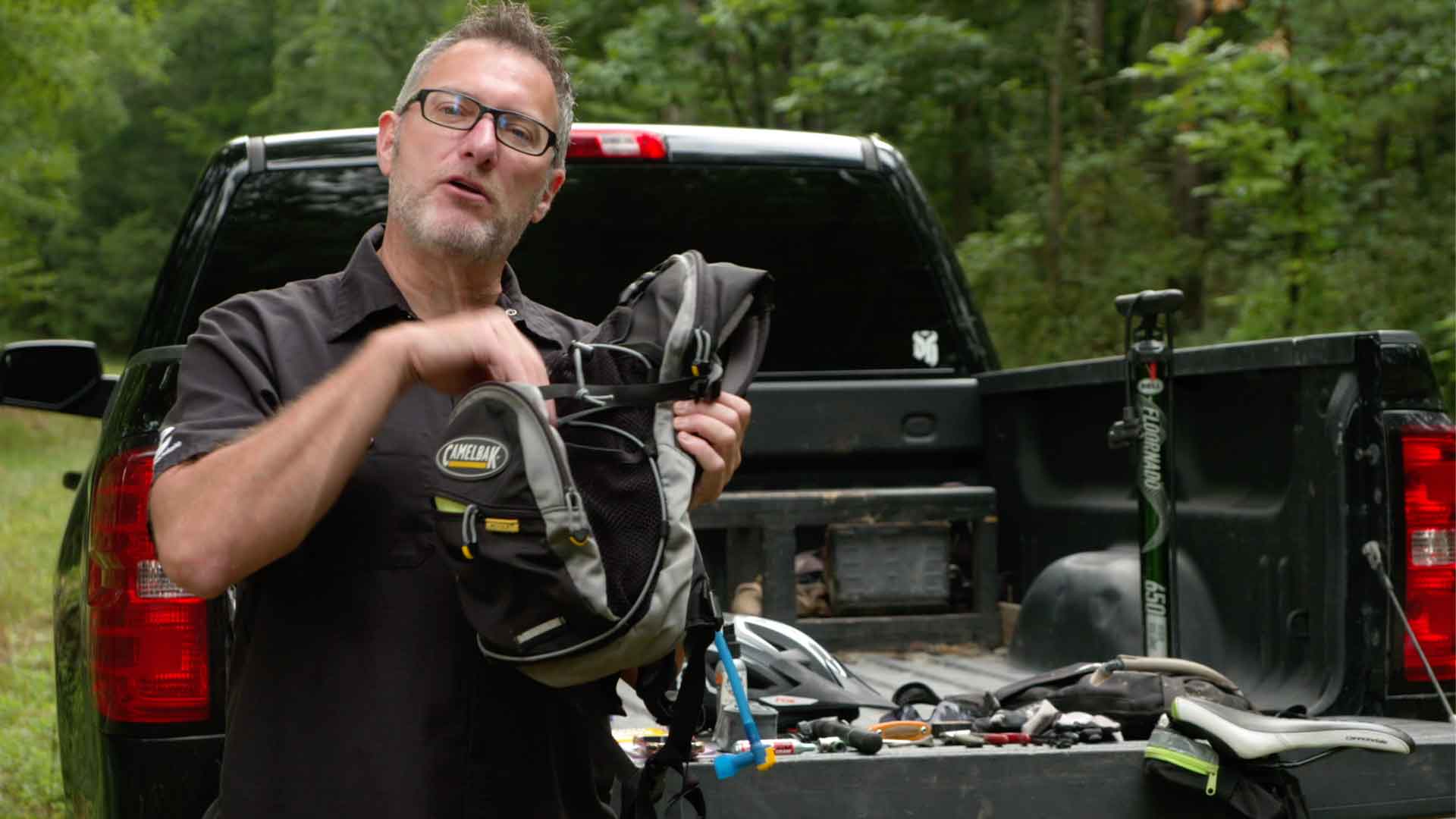 man demonstration cycling gear