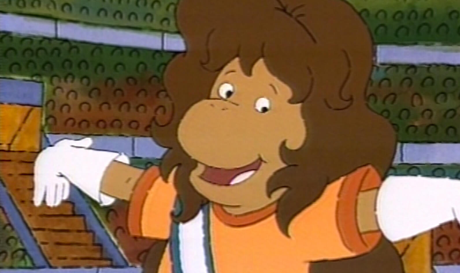 A cartoon character with an orange shirt