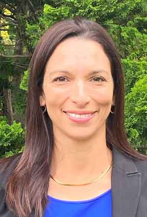 Woman with long brown hair.
