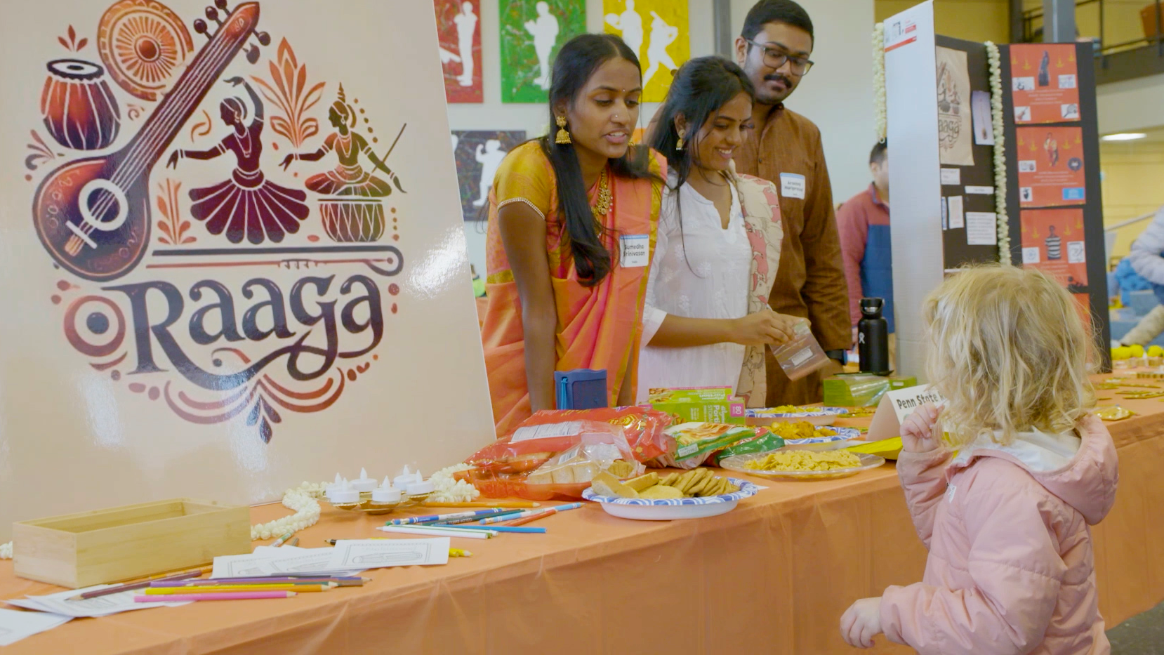 A child visits a booth at the Multicultural Children's Festival.