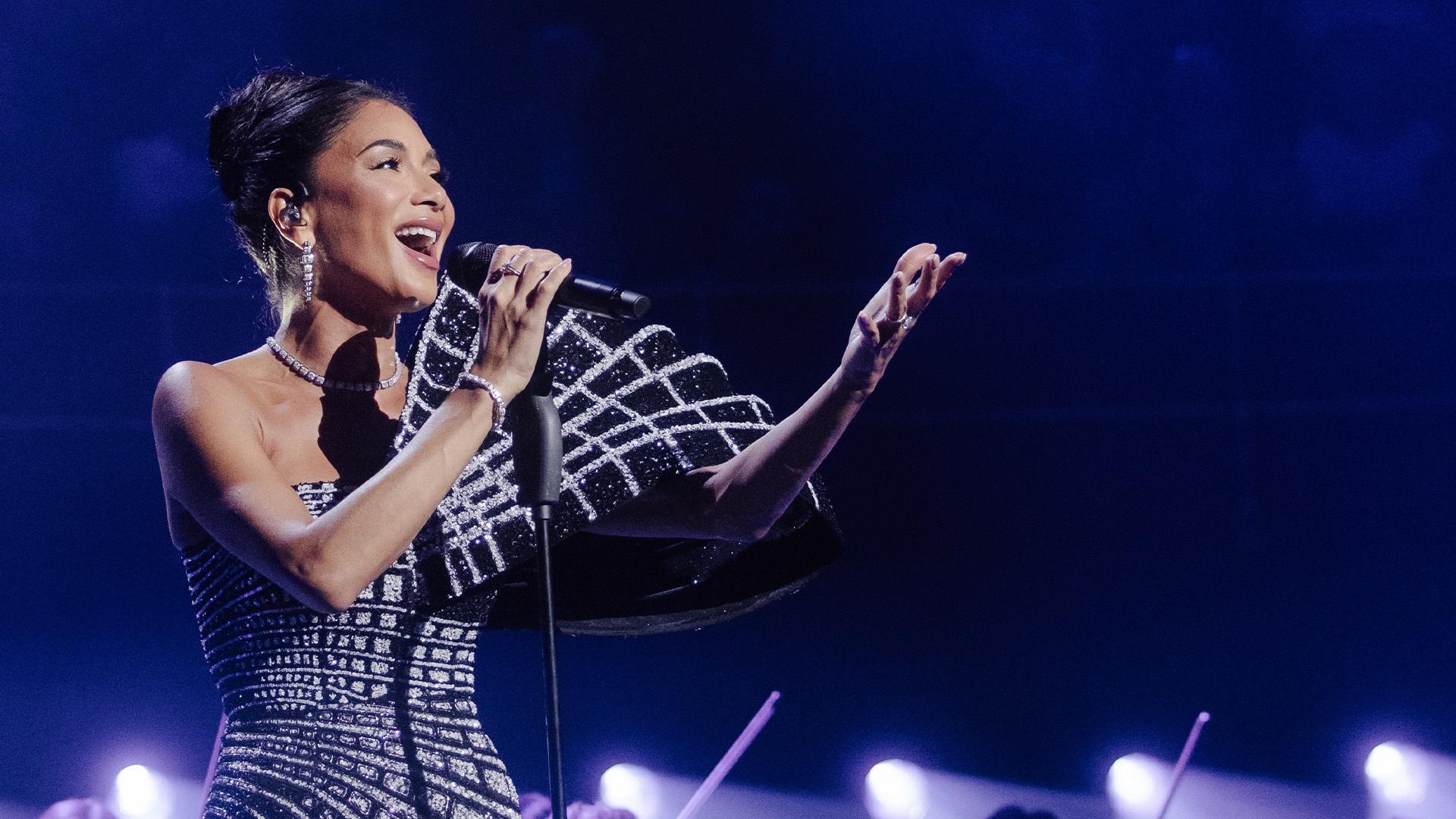 Nicole Scherzinger singing a stage at Royal Albert Hall