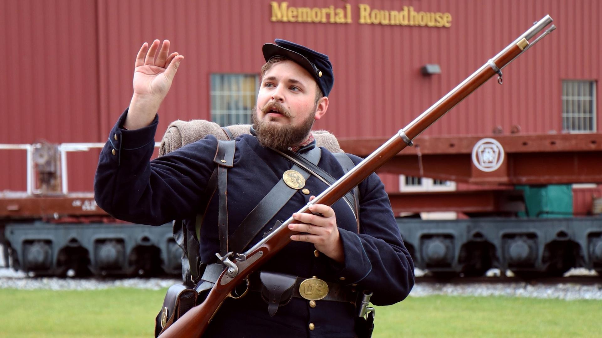 Man dressed as a Union soldier from the American Civil War.